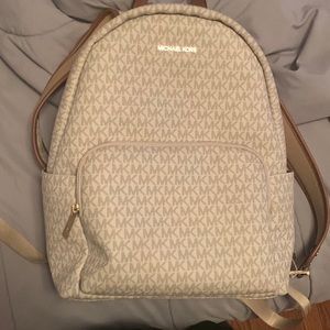 White Michael Kors Backpack
Bright Gold Signature